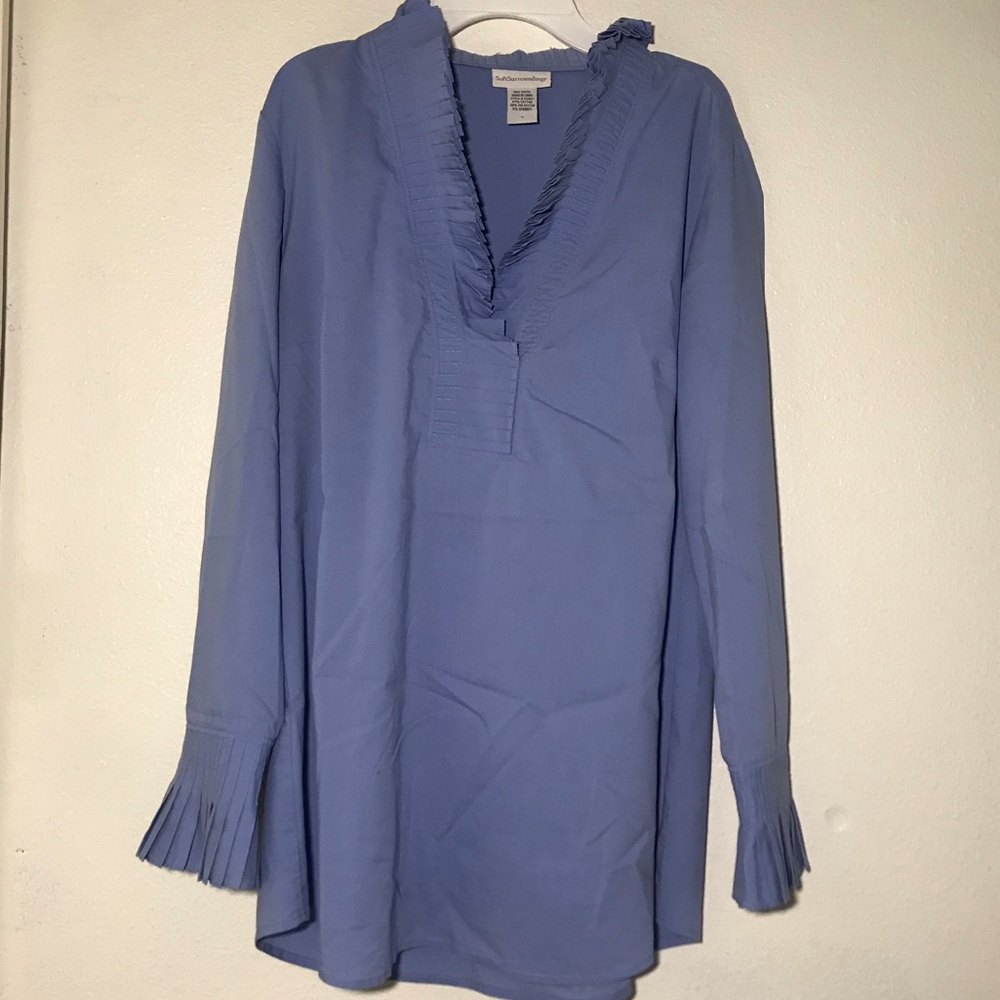 Light blue blouse.
